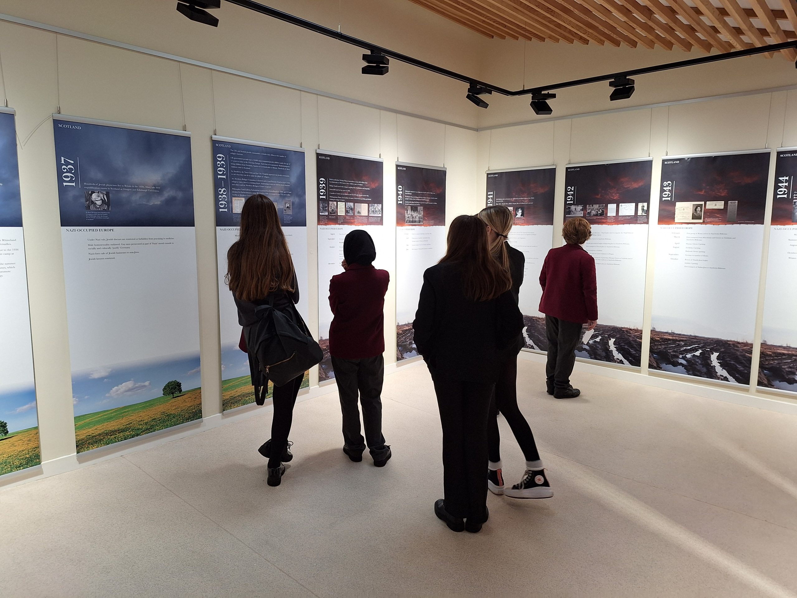 School visit holocaust memorial day viewing holocaust timeline display